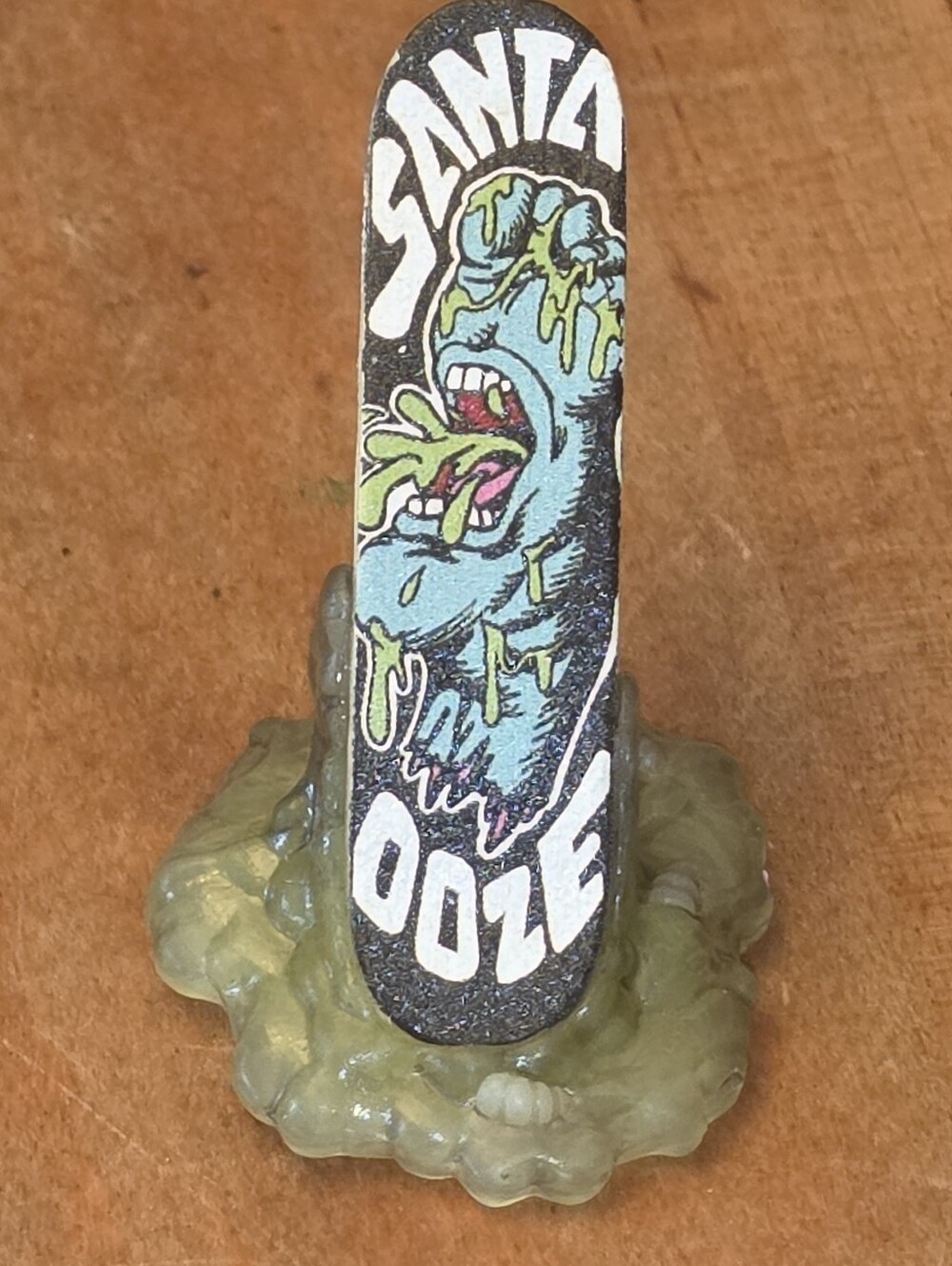 Zuru 5 Surprise Mega Gross Minis Santa Ooze Skateboard
